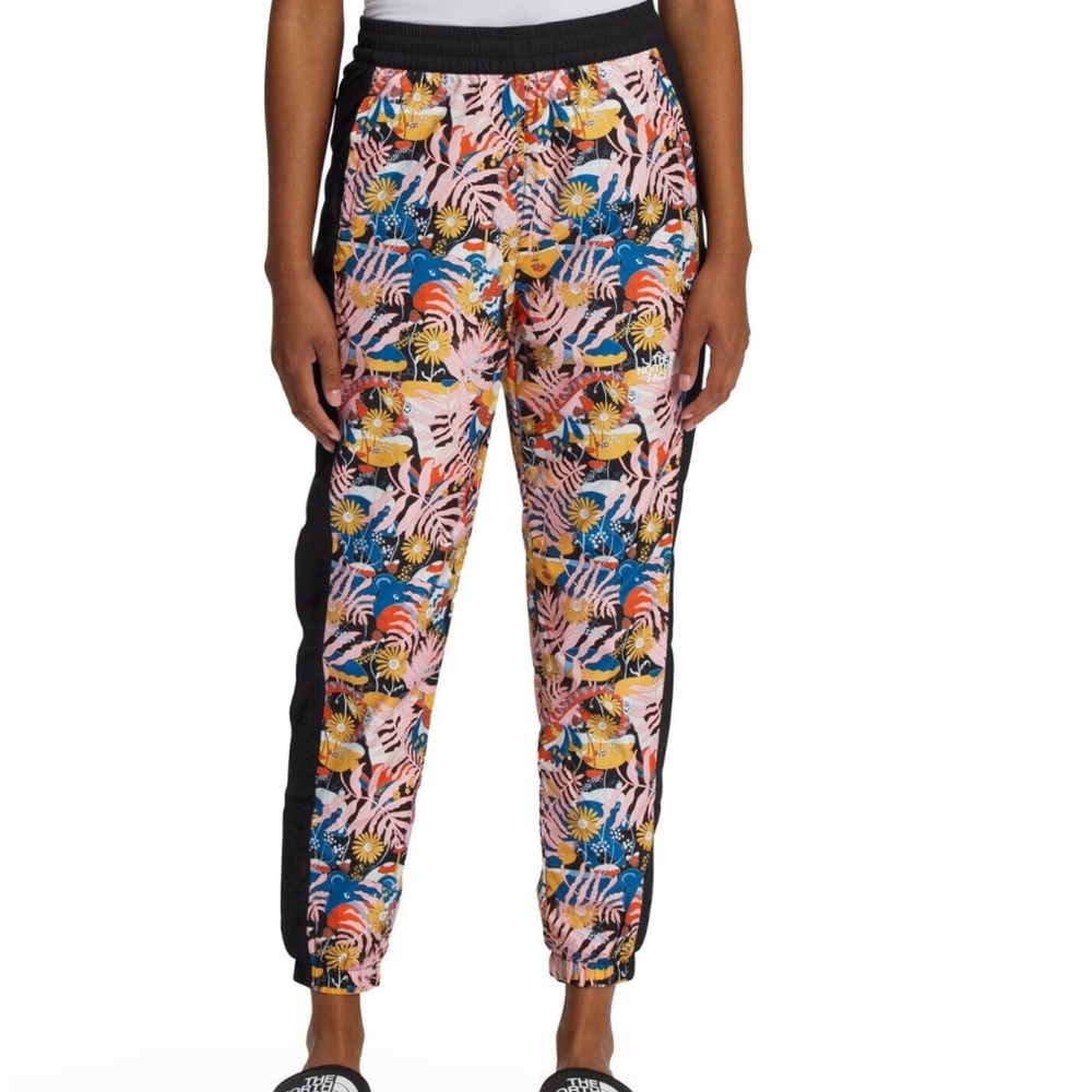 NWT floral print north face wind breaker joggers.